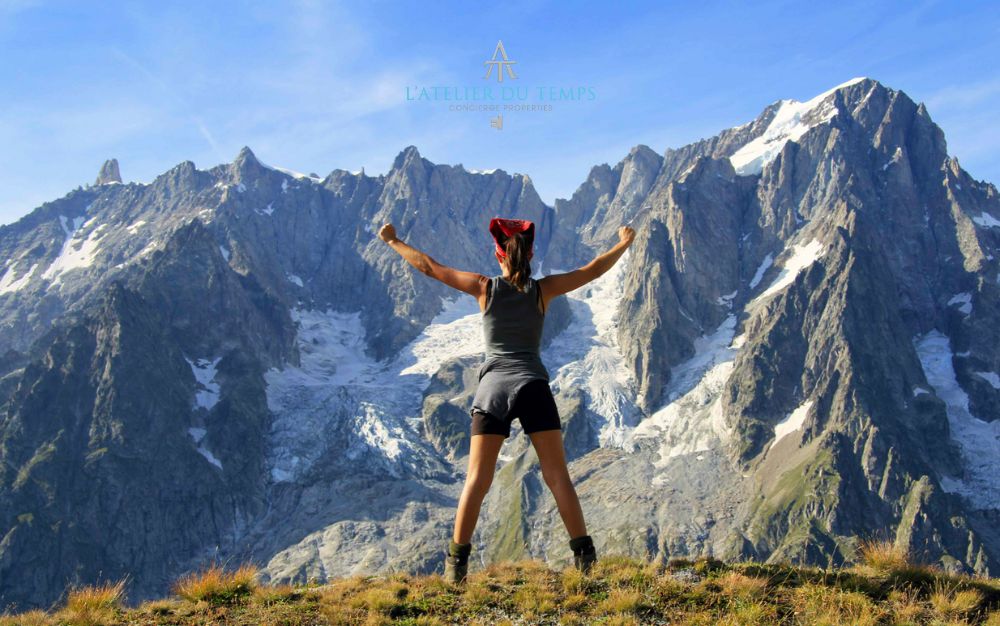 Hiker admiring the view of Mont Blanc during a trek in Courmayeur
