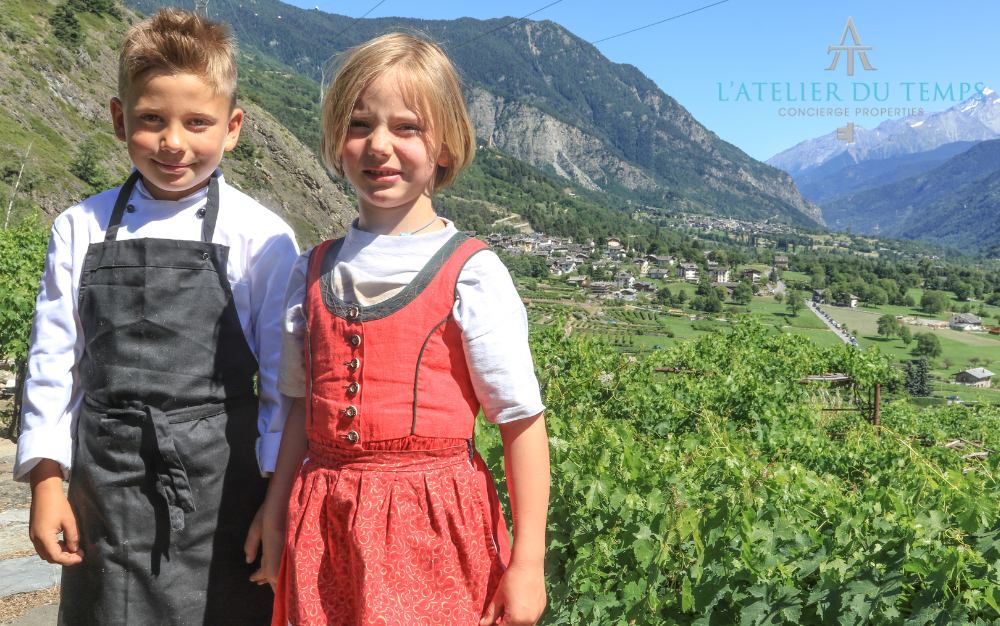 Children in Morgex among the vineyards beneath Mont Blanc